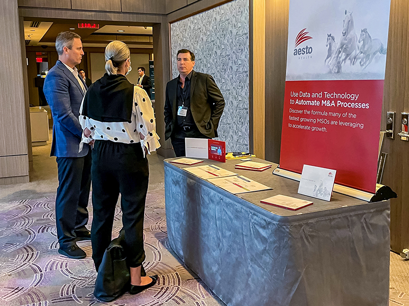 People networking with Aesto Health